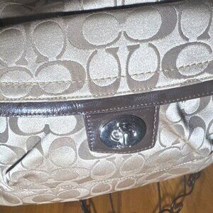 Coach Penelope signature turn lock flap hobo bag (2008-2009)